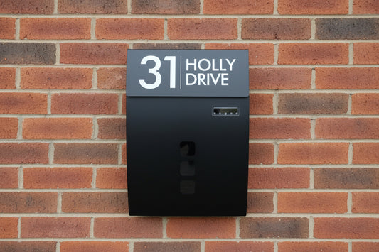 mailbox with customised address engraved on lid