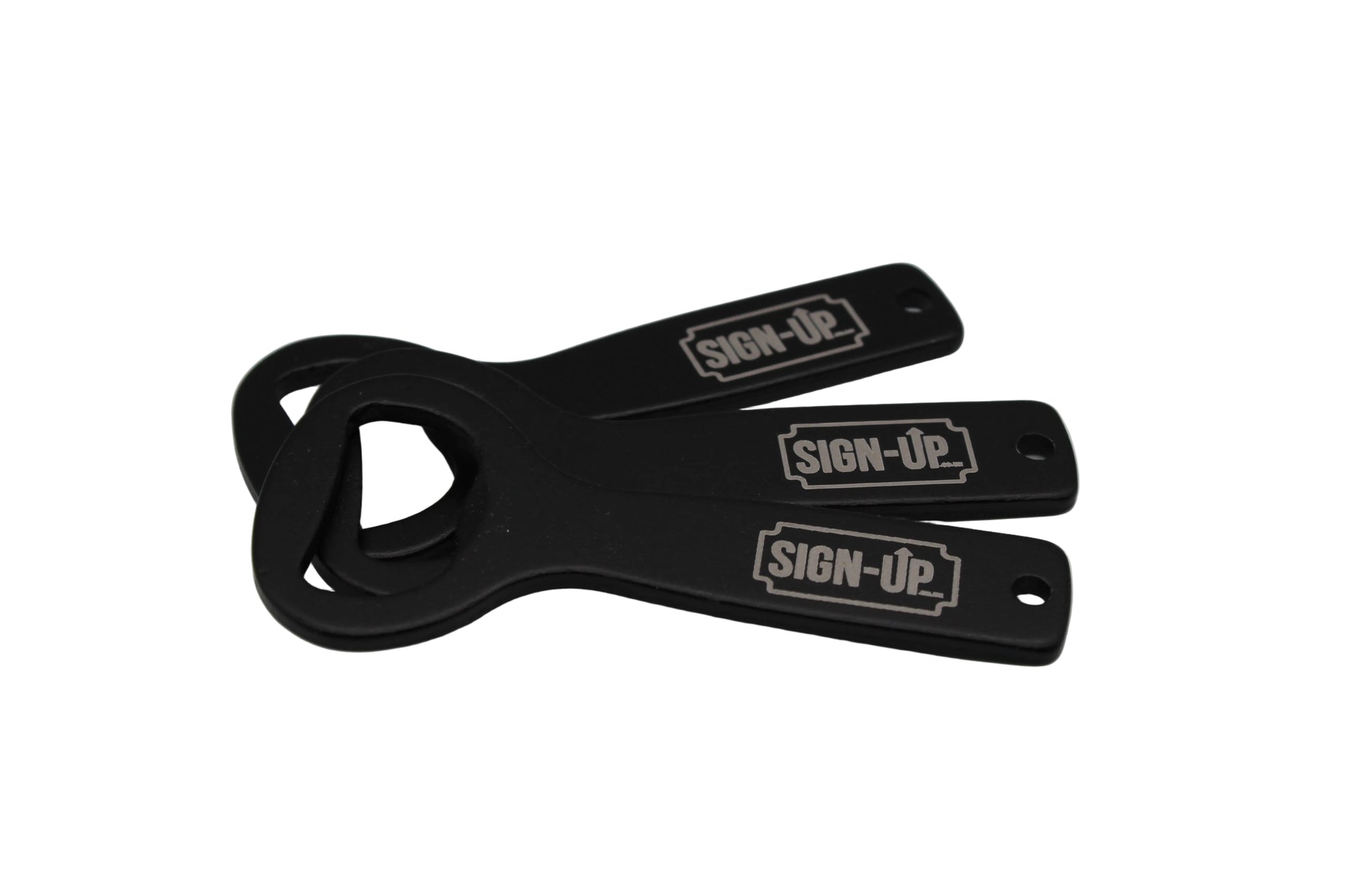 black branded bottle opener with company logo engraved
