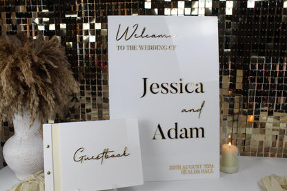white and gold wedding sign